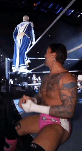 Wrestler In Blue Robe Number 666 GIF