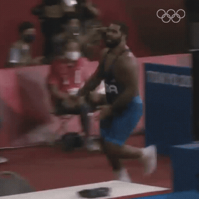 Wrestler In Blue Uniform Running On Track GIF