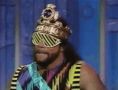 Wrestler In Crown And Sunglasses Saying Ooh GIF
