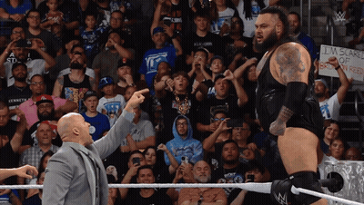Wrestler In Front Of Crowd With Sign I'm Scared Of Braun Red GIF