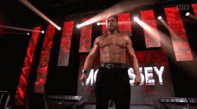 Wrestler In Front Of Large Screen Mc Sey GIF
