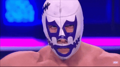 Wrestler In Purple And White Mask With Mouth Hole GIF