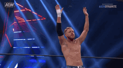 Wrestler In Red And Silver Mask In Ring GIF