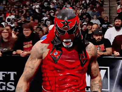 Wrestler In Red Black Mask Crowd GS Sign GIF
