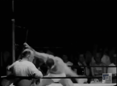 Wrestler in Ring With FFA Logo