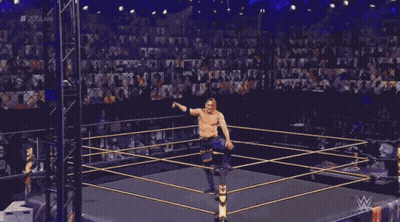 Wrestler In Ring With Letter W GIF