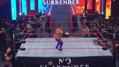 Wrestler In Ring With Surrender Sign GIF