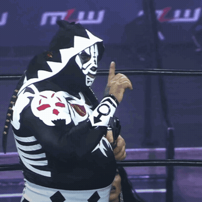 Wrestler In Skeleton Costume Holding Championship Belt GIF