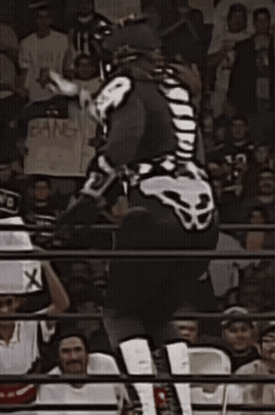 Wrestler In Skeleton Costume Jumping GIF