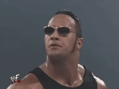 Wrestler In Sunglasses And Black Tank Top With WWE GIF