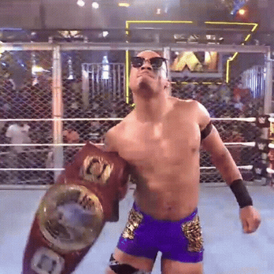 Wrestler In Sunglasses Holding Championship Belt GIF