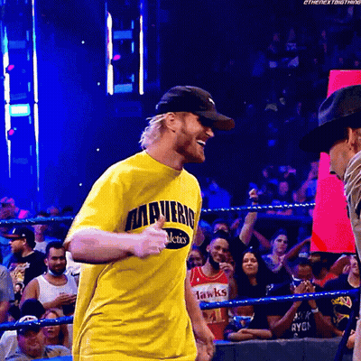 Wrestler In Yellow Mavericks Shirt GIF