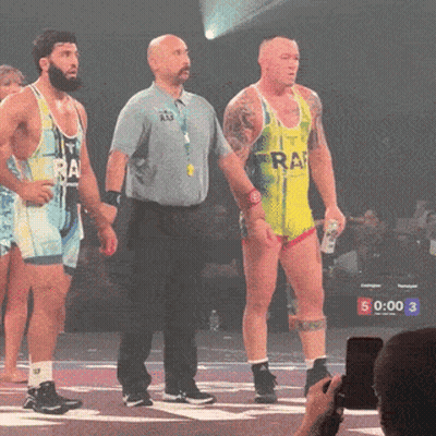 Wrestler In Yellow Tank Top Saying Raf GIF