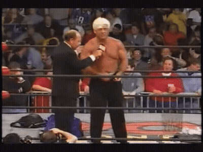 Wrestler Interviewed By Man In Suit GIF