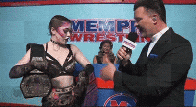 Wrestler Interviewed In Front Of Memphis Sign GIF