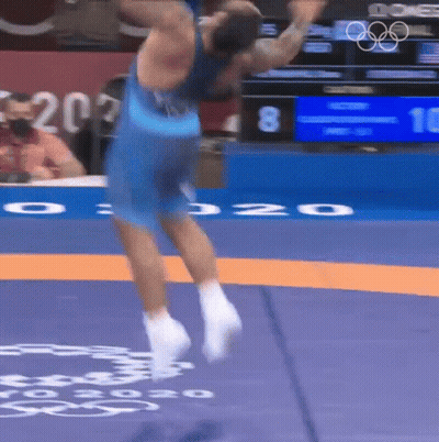Wrestler Jumping In Front Of Scoreboard 10 GIF