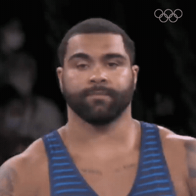 Wrestler Jumping In Front Of Scoreboard With Number 10 GIF