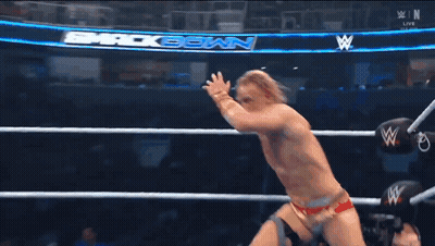 Wrestler Jumping In Ring During Match GIF
