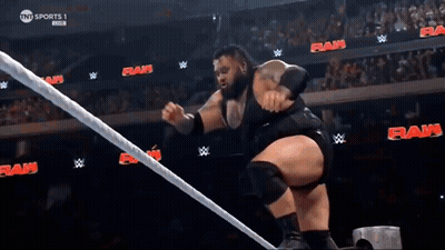 Wrestler Jumping Over Rope During Match GIF