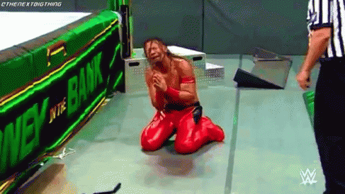 Wrestler Kneeling Green Money In The Bank Banner GIF