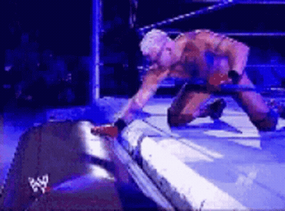 Wrestler Kneeling With Sword GIF