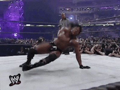 Wrestler Laying On Floor In Wrestling Ring GIF