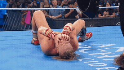 Wrestler Laying On Floor With Academy Text GIF