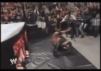 Wrestler Laying On Ground In Wrestling Ring GIF