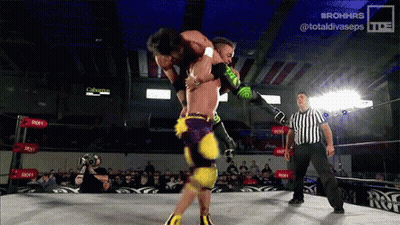 Wrestler Lifted By Another While Referee Watches GIF
