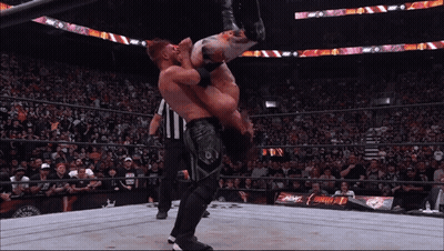 Wrestler Lifted By Another Wrestler GIF