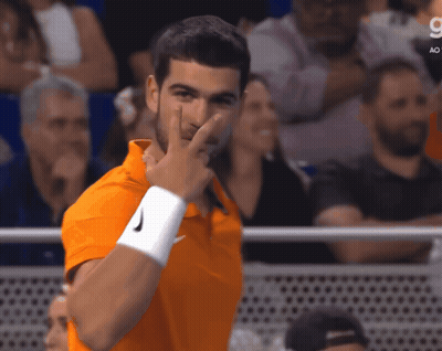 Wrestler Lifted In Air By Another Wrestler In Front Of 403 Sign GIF