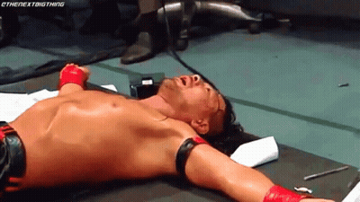 Wrestler Lying Face Down Arms Outstretched GIF