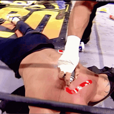 Wrestler Lying On Ground With Next Thing Sticker GIF