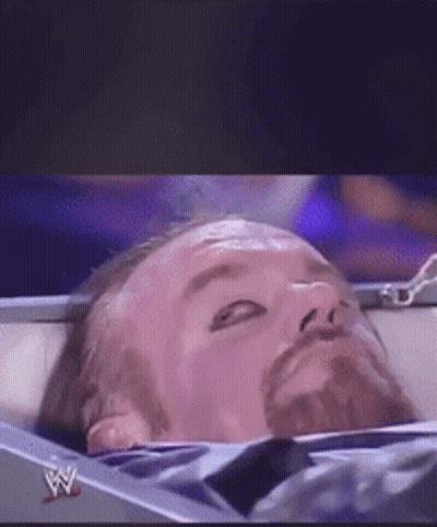 Wrestler Lying On Ring Floor Live GIF