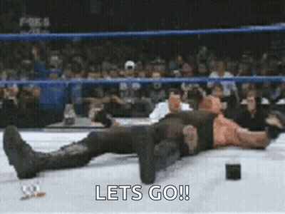 Wrestler Lying On Ring With Lets Go GIF