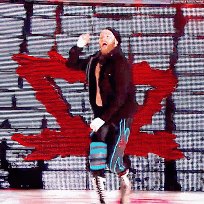 Wrestler On Stage With Red Canadian Flag GIF