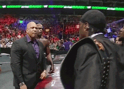 Wrestler R-Truth Tossing Drink GIF
