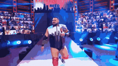 Wrestler Reed Walking Down Arena Aisle GIF