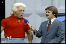 Wrestler Ric Flair Woo Shaking Head Reaction GIF