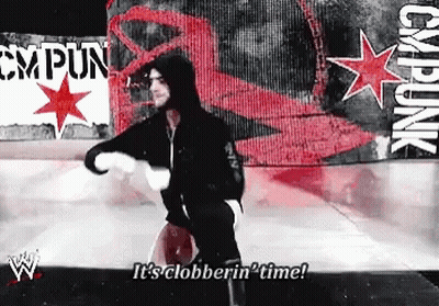 Wrestler Saying Clobberin Time In Front Of CM Punk Banner GIF