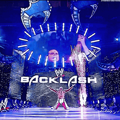 Wrestler Standing Before Backlash Banner GIF