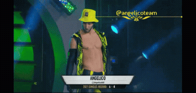 Wrestler Standing In Front Of Wrestling Sign GIF