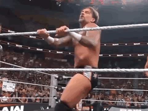 Wrestler Standing In Ring Holding Rope GIF