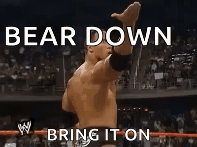 Wrestler Standing In Ring With Arms Up Saying Bear Down Bring It On GIF