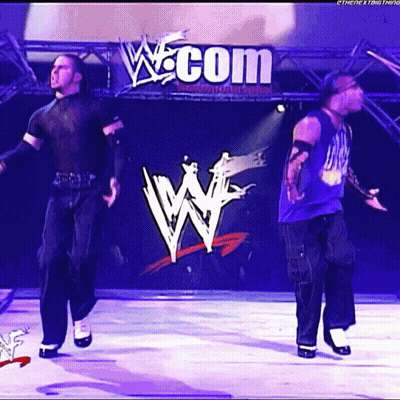 Wrestler Standing On Ladder Holding Rope GIF