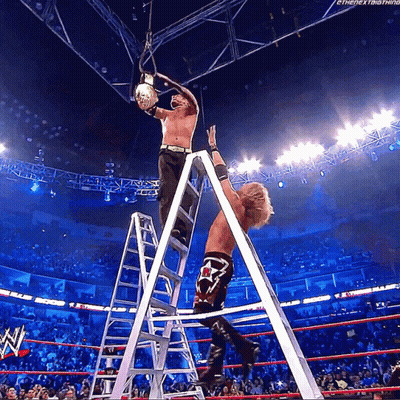 Wrestler Standing On Ladder Holding Rope GIF