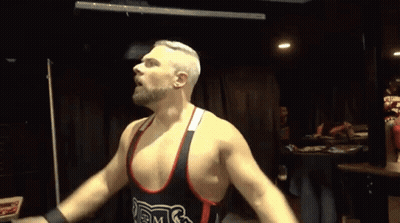 Wrestler Standing With Arms Out GIF