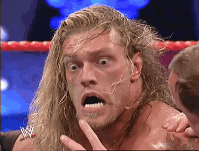 Wrestler Surprised Face In Ring GIF