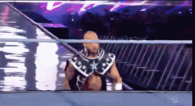Wrestler Walking Out Of Ring With Crowd Watching GIF