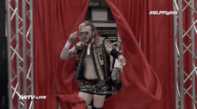 Wrestler Walking Through Red Curtain IWTV Live GIF